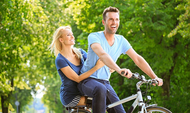 Couple riding a bike 